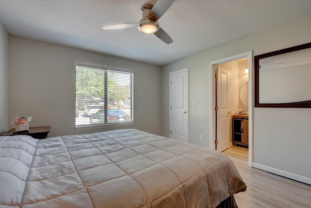 8483 Yadkin Cir Unit D, North Charleston, SC 29406 - bedroom with light wood-style floors, ceiling fan, and ensuite bath