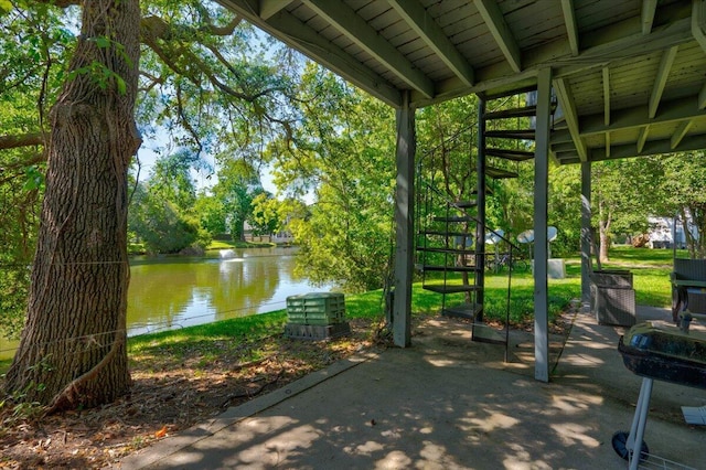 8483 Yadkin Cir Unit D, North Charleston, SC 29406 - view of home's community featuring a water view, stairs, and a patio area