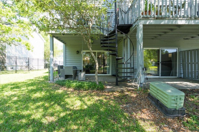 8483 Yadkin Cir Unit D, North Charleston, SC 29406 - rear view of property with stairway and a patio area