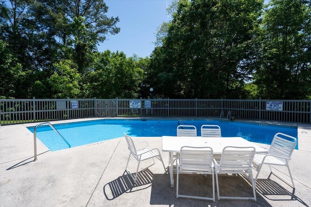 8483 Yadkin Cir Unit D, North Charleston, SC 29406 - community pool featuring a patio and view of scattered trees