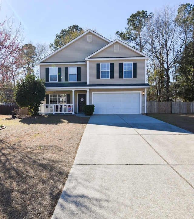 front facade featuring covered porch and a garage