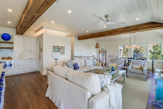 living room featuring ceiling fan, dark wood-type flooring, beam ceiling, and wooden ceiling