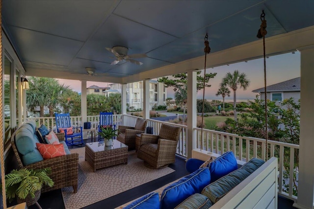 sunroom / solarium with ceiling fan