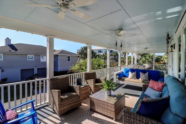 deck featuring ceiling fan and an outdoor hangout area