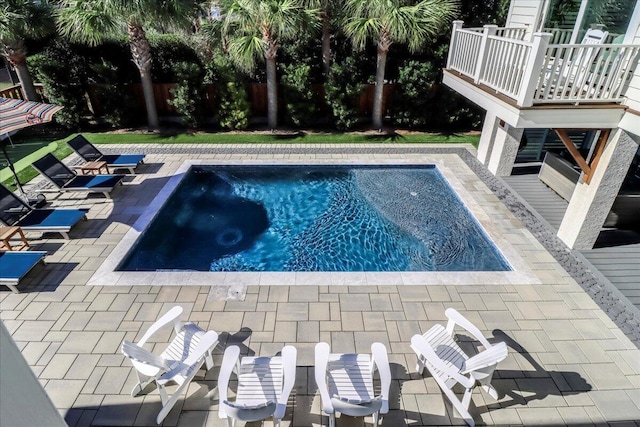 view of pool with a patio area