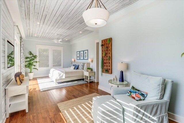 bedroom with wood-type flooring and wood ceiling