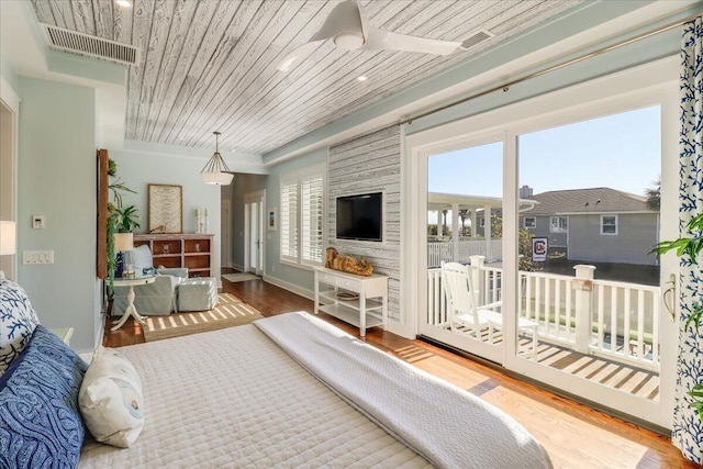 bedroom featuring wooden ceiling, access to outside, and hardwood / wood-style floors