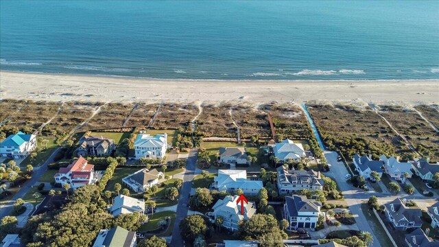 drone / aerial view with a view of the beach and a water view