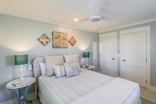 bedroom with ceiling fan and crown molding