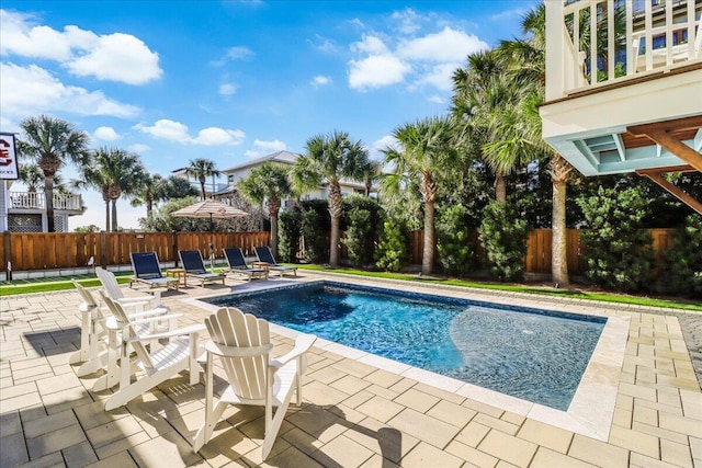 view of swimming pool featuring a patio