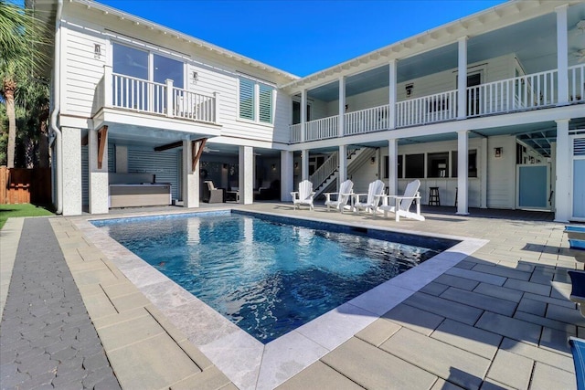 view of swimming pool with a patio area