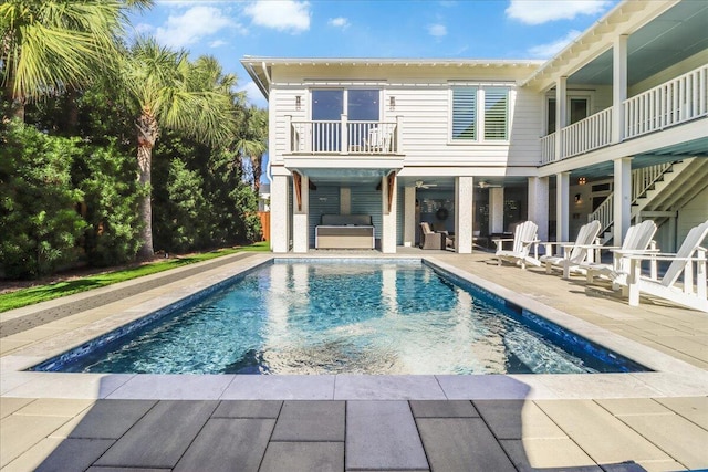 view of swimming pool featuring a patio area