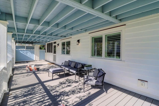 wooden deck with outdoor lounge area