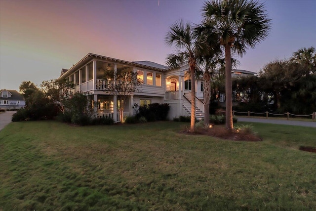 view of front of home with a yard