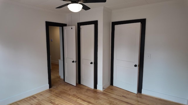 unfurnished bedroom featuring light hardwood / wood-style floors, ceiling fan, and ornamental molding