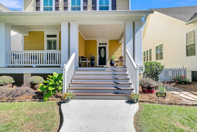 doorway to property featuring covered porch