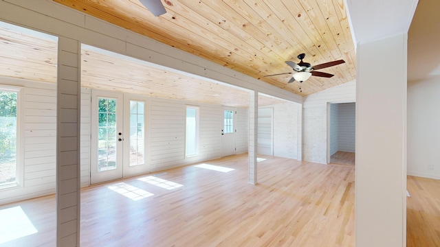 interior space featuring french doors, wood ceiling, vaulted ceiling, light hardwood / wood-style flooring, and ceiling fan