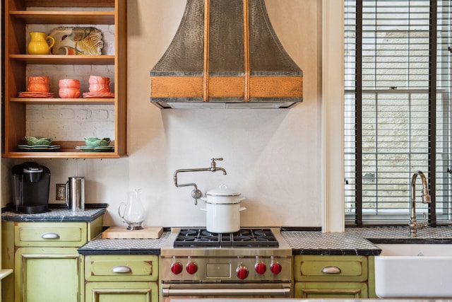 kitchen with sink and high end stove