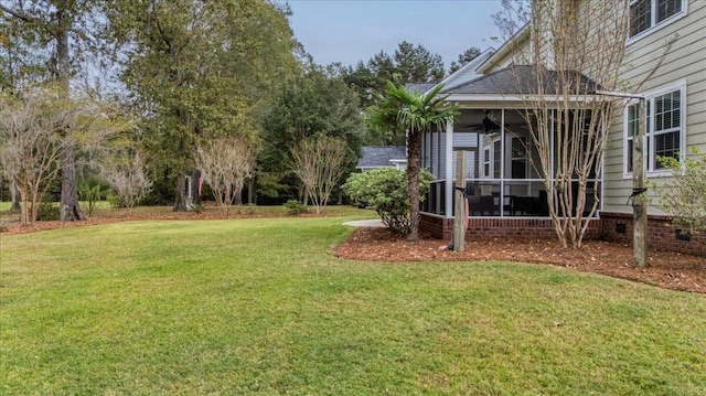 view of yard with a sunroom