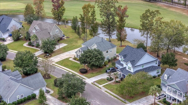 birds eye view of property featuring a water view