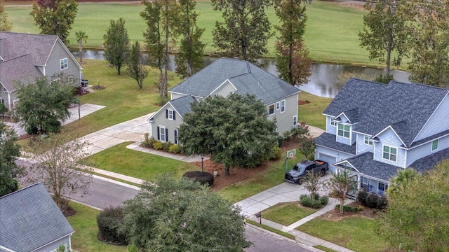 bird's eye view with a water view