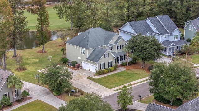 bird's eye view with a water view