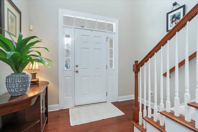 foyer with dark hardwood / wood-style flooring