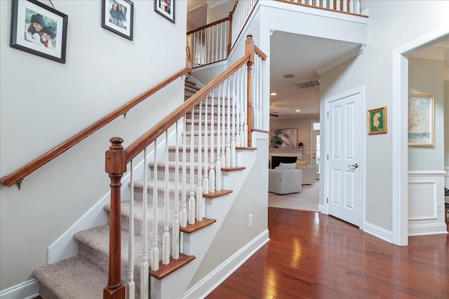 stairs with wood-type flooring