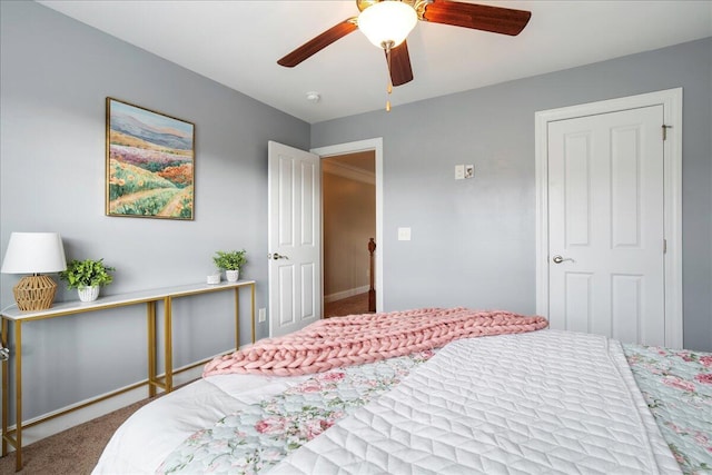 bedroom with ceiling fan and carpet flooring