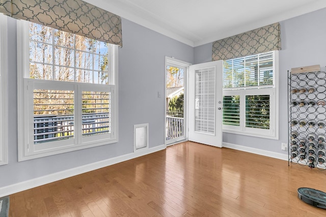 spare room featuring hardwood / wood-style flooring