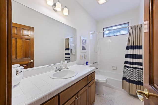 bathroom with toilet, tile patterned floors, shower / bath combo with shower curtain, and vanity