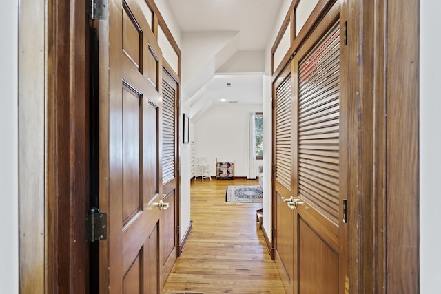 hall with light wood-style flooring