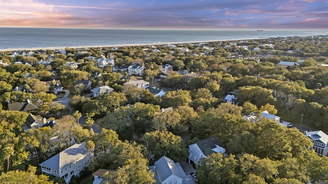 aerial view at dusk with a water view