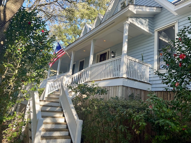 doorway to property featuring covered porch