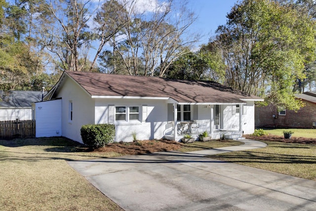 view of front of property with a front yard and a porch