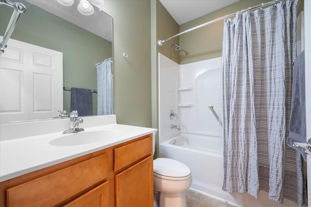 full bathroom featuring vanity, shower / tub combo with curtain, tile patterned floors, and toilet