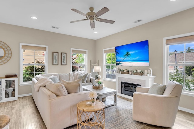2961 Waterleaf Rd, Johns Island, SC 29455 - living area featuring light wood-type flooring, baseboards, healthy amount of natural light, ceiling fan, and recessed lighting