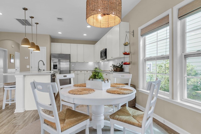 2961 Waterleaf Rd, Johns Island, SC 29455 - dining room featuring light wood-type flooring, baseboards, and recessed lighting