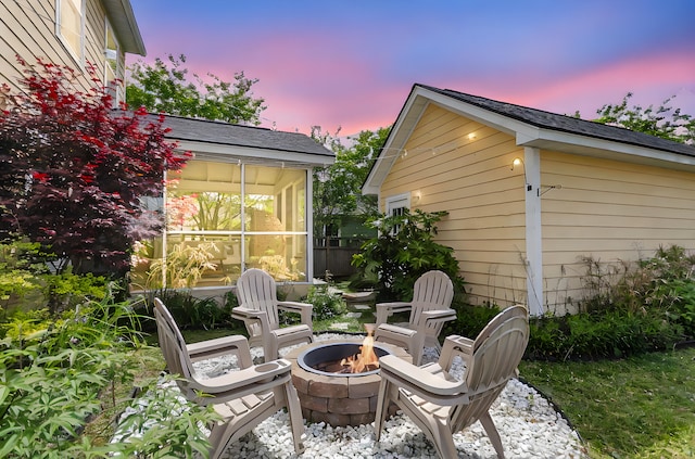 2961 Waterleaf Rd, Johns Island, SC 29455 - view of patio / terrace featuring an outdoor fire pit and a sunroom