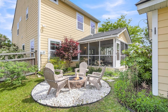 2961 Waterleaf Rd, Johns Island, SC 29455 - rear view of property featuring a fire pit and a sunroom