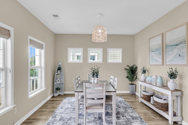 2961 Waterleaf Rd, Johns Island, SC 29455 - dining area featuring light wood-style floors and baseboards