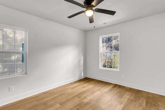 unfurnished room featuring ceiling fan and light hardwood / wood-style floors