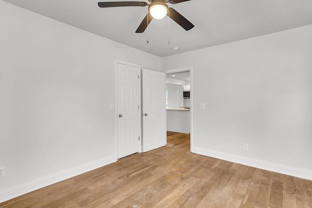 empty room with wood-type flooring