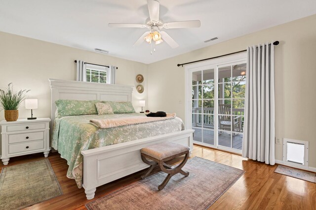 8346 Chisolm Plantation Rd, Edisto Island, SC 29438 - bedroom featuring access to exterior, wood finished floors, and ceiling fan