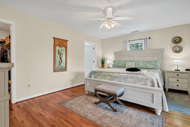 8346 Chisolm Plantation Rd, Edisto Island, SC 29438 - bedroom featuring wood finished floors, ceiling fan, and baseboards