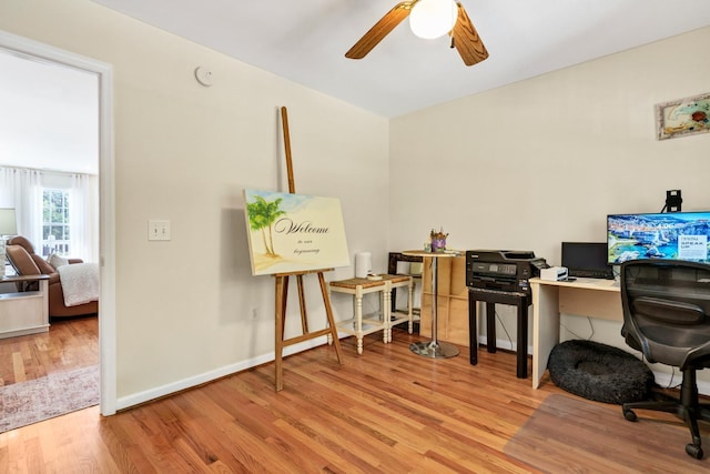 8346 Chisolm Plantation Rd, Edisto Island, SC 29438 - office space with wood finished floors, a ceiling fan, and baseboards