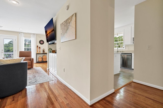8346 Chisolm Plantation Rd, Edisto Island, SC 29438 - living room featuring light wood-style flooring and baseboards