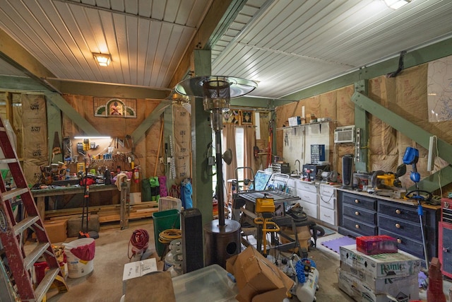 8346 Chisolm Plantation Rd, Edisto Island, SC 29438 - miscellaneous room featuring a workshop area and carpet