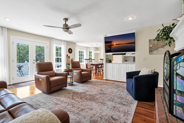 8346 Chisolm Plantation Rd, Edisto Island, SC 29438 - living room featuring a ceiling fan, wood finished floors, french doors, and recessed lighting
