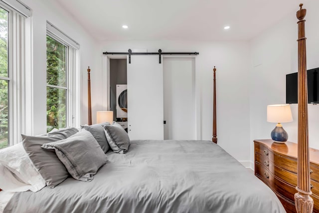 bedroom with a barn door